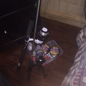 The fishing rods both if them the tackle box